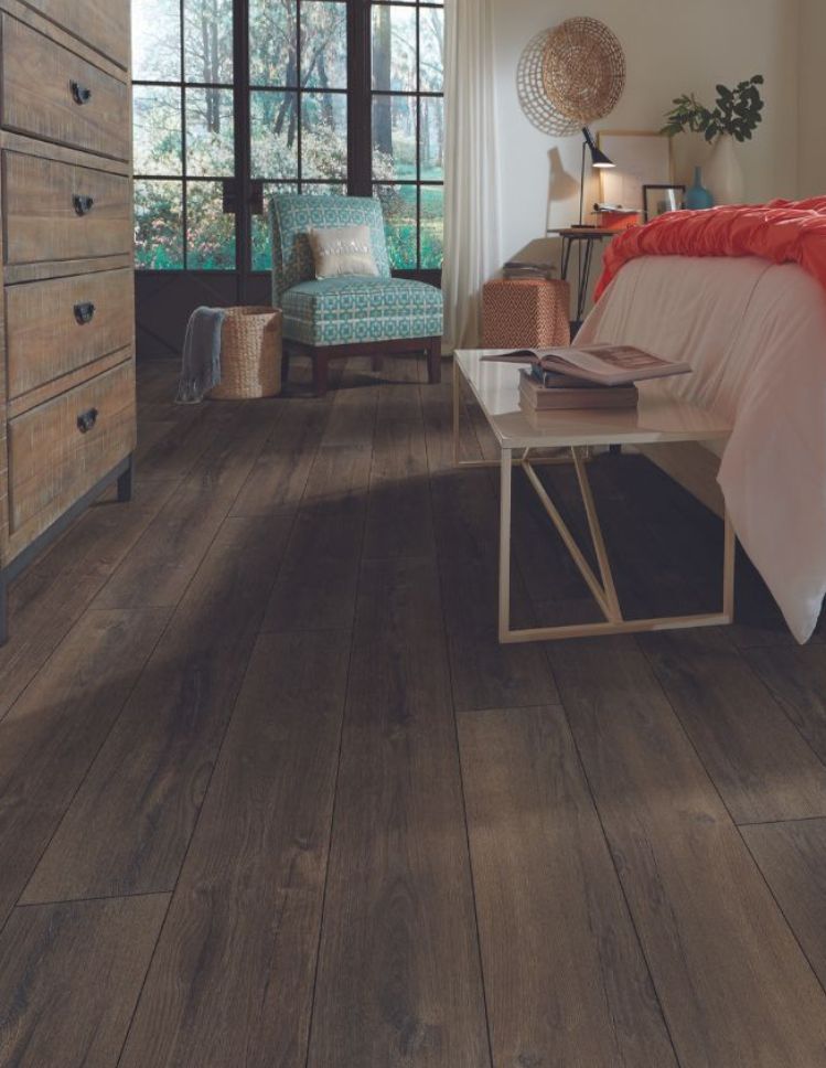 dark wood look luxury vinyl flooring in a Hanover PA bedroom