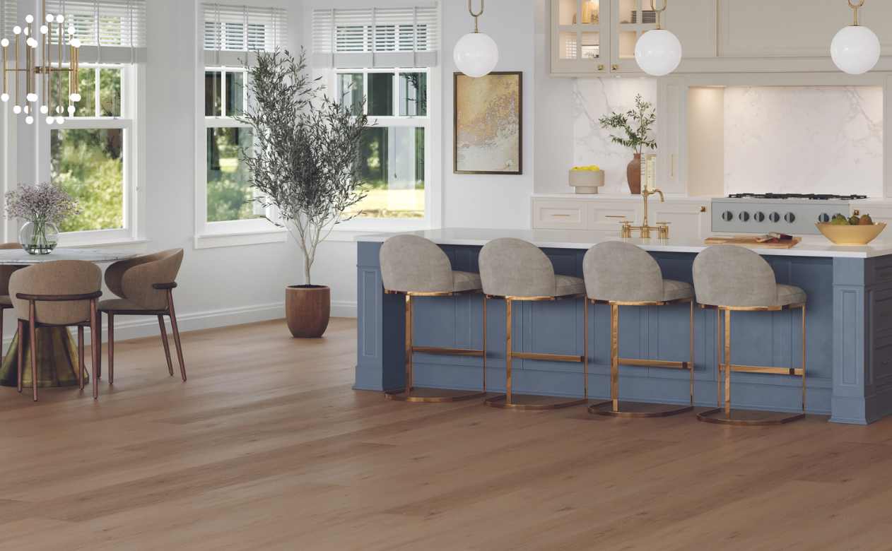 luxury vinyl in kitchen with blue island and marble backsplash